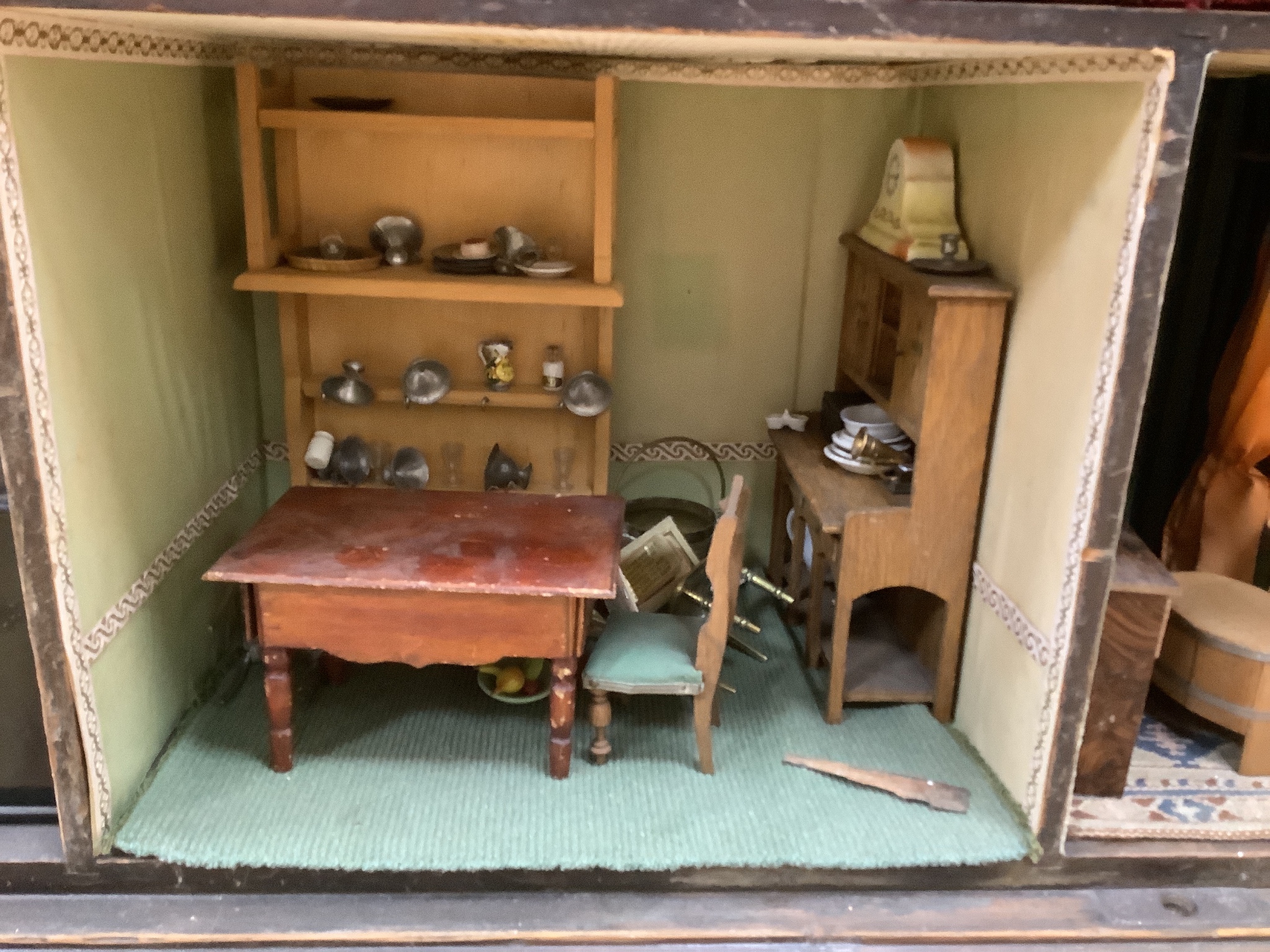 A furnished English dolls’ house, circa 1810-20, 104cm high